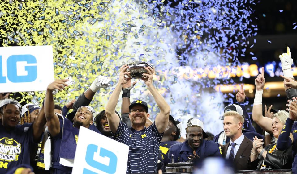 Michigan Wolverines head coach Jim Harbaugh celebrates the 43-22 win against the Purdue Boilermakers in the Big Ten Championship game at Lucas Oil Stadium in Indianapolis Saturday, December 03, 2022.