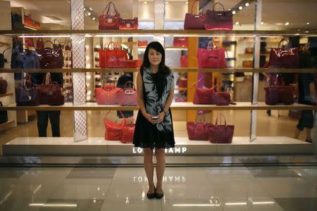 Zhou Yu, who was born in 1981, poses for a photograph in Shanghai August 28, 2014. REUTERS/Carlos Barria/Files