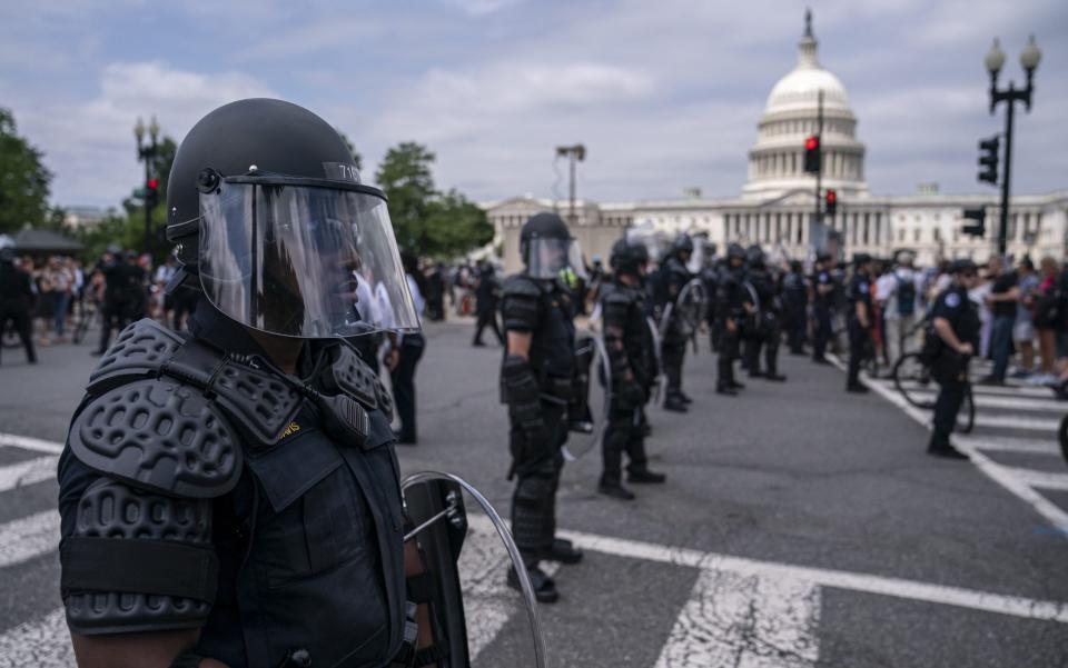 Officers in full riot gear have sealed the perimeter of the Supreme Court - GETTY IMAGES