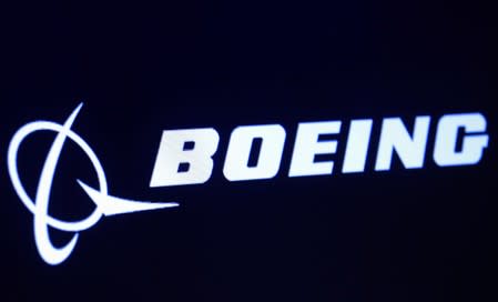 The company logo for Boeing is displayed on a screen on the floor of the NYSE in New York