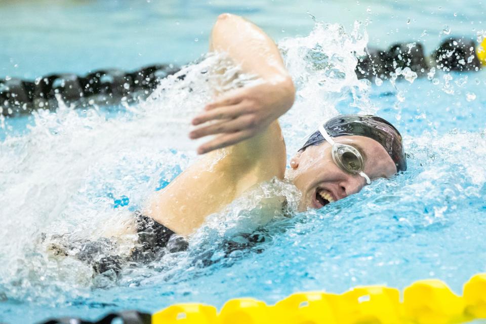 Penn’s Lilian Christianson competes in the 100-yard freestyle event during the girls sectional swimming preliminaries Thursday, Feb. 2, 2023 at Penn High School.