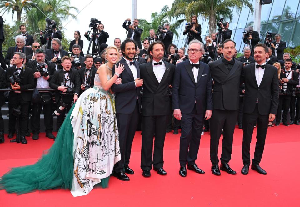 Maria Bakalova, Ali Abbasi, Sebastian Stan, Martin Donovan, Daniel Bekerman and Jacob Jarek attend the ’The Apprentice’ Red Carpet at the 77th annual Cannes Film Festival on 20 May 2024 (Getty)