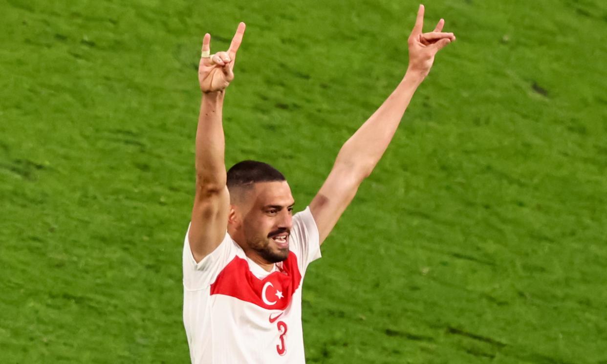 <span>Merih Demiral displayed the ‘wolf salute’ after scoring in Turkey’s round of 16 match against Austria.</span><span>Photograph: Hannibal Hanschke/EPA</span>