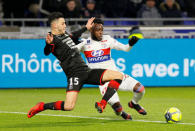 Soccer Football - Ligue 1 - Olympique Lyonnais vs Rennes - Groupama Stadium, Lyon, France - February 11, 2018 Lyon's Maxwel Cornet in action with Stade Rennes’ Ramy Bensebaini REUTERS/Emmanuel Foudrot