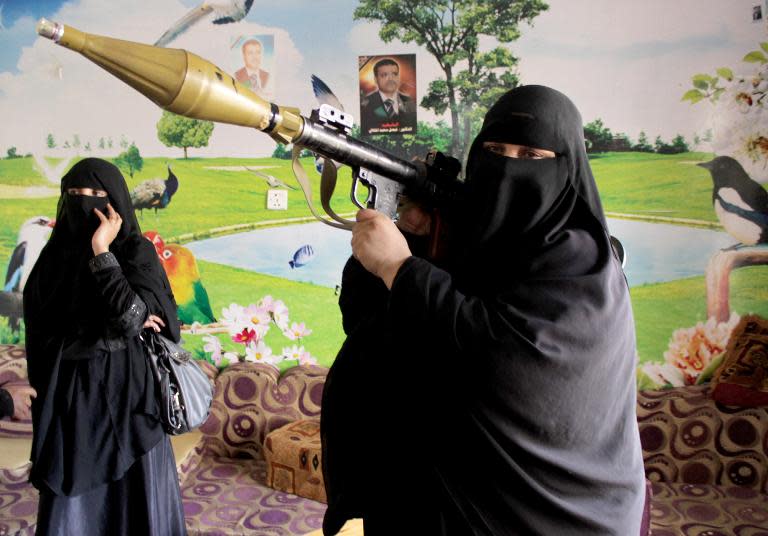 A Yemeni woman in Taez on May 4, 2015 after reportedly asking to join the Popular Resistance Committees loyal to President Abedrabbo Mansour Hadi