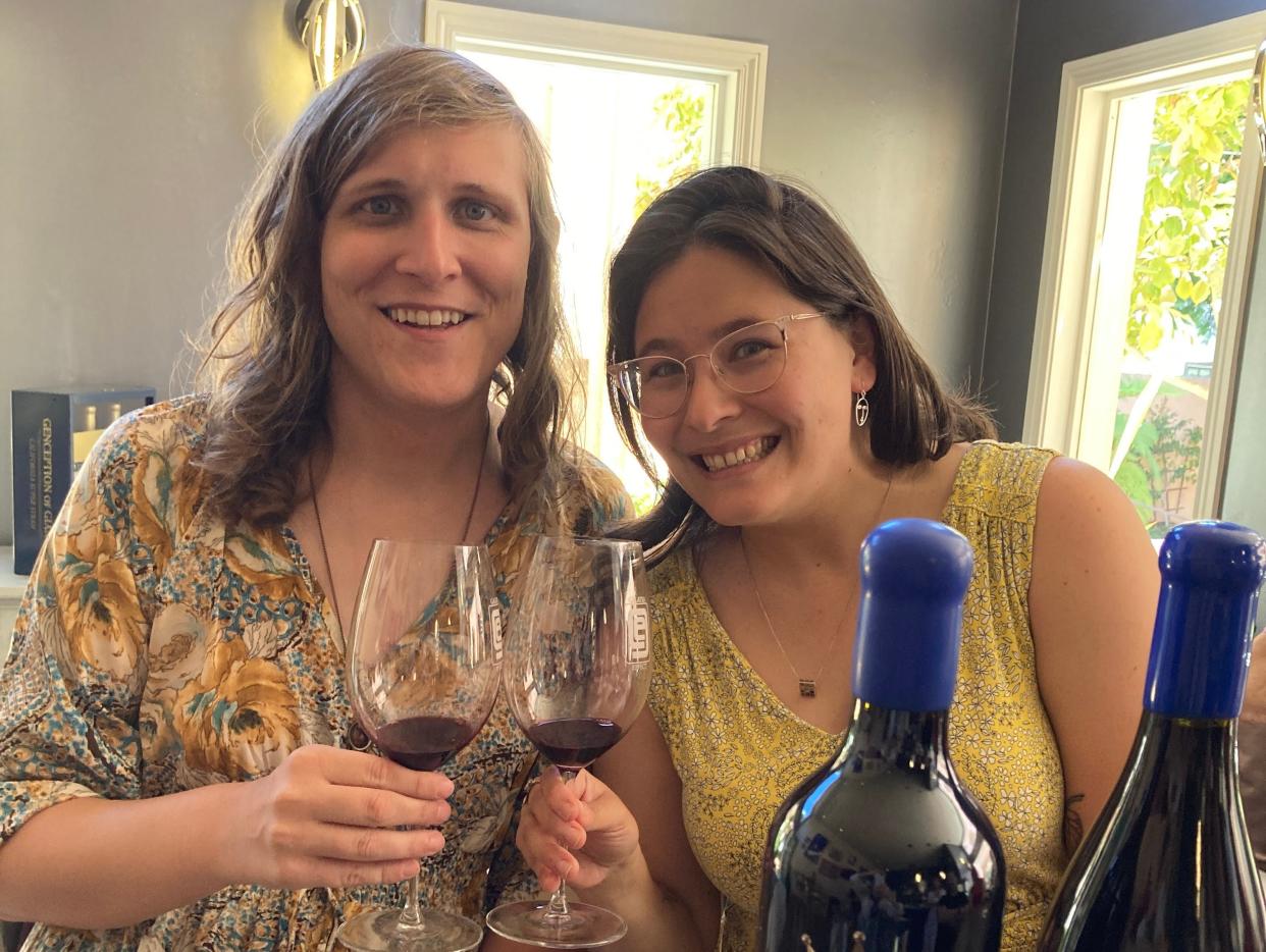 Miriam Cantor-Stone and her wife cheering with wine