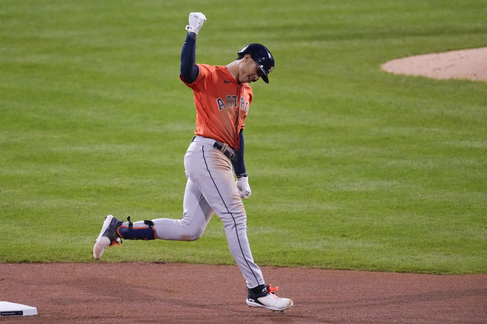 Houston Astros' Jeremy Pena celebrates his solo home run during the fourth inning in Game 5 of baseball's World Series between the Houston Astros and the Philadelphia Phillies on Thursday, Nov. 3, 2022, in Philadelphia. (AP Photo/Matt Rourke)