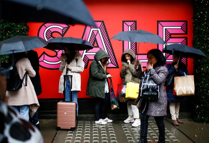 FILE PHOTO: Shoppers on Oxford Street during Boxing Day sales in central London