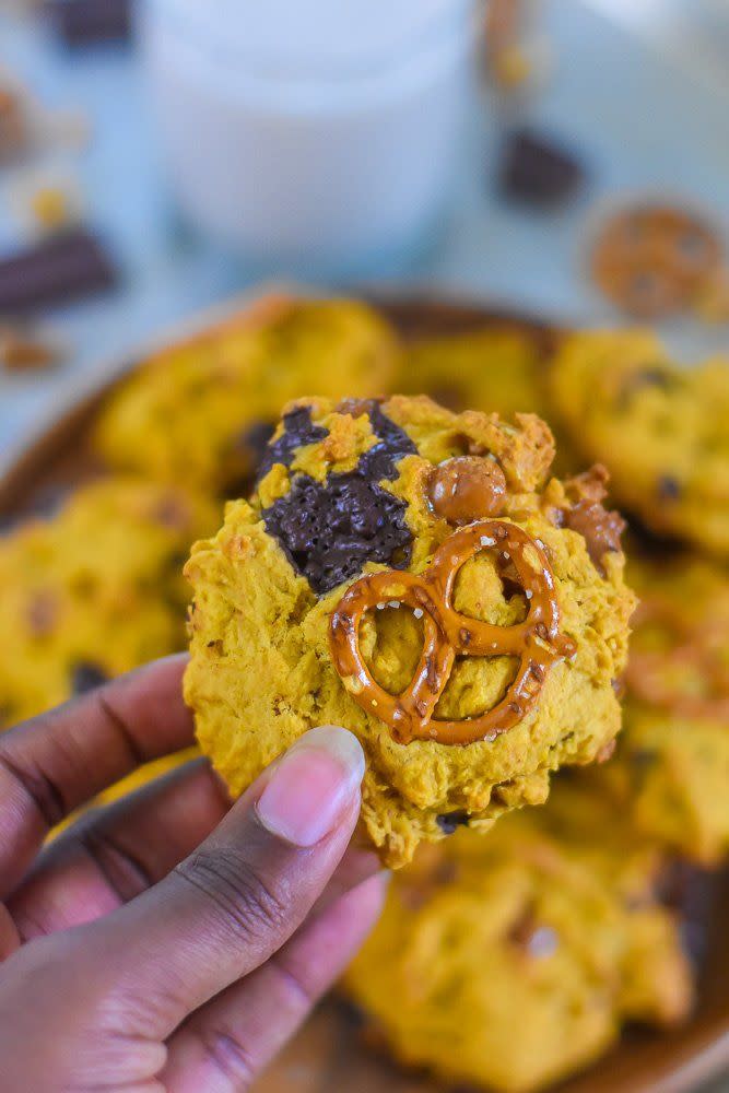 <p>Pretzels, chocolate chips, potato chips, and more can be tossed into this pumpkin cookie mix. You'll have a new flavor every time you make a batch!</p><p><strong>Get the recipe at <a href="https://www.dashofjazz.com/pumpkin-kitchen-sink-cookies/" rel="nofollow noopener" target="_blank" data-ylk="slk:Dash of Jazz;elm:context_link;itc:0;sec:content-canvas" class="link ">Dash of Jazz</a>.</strong> </p>