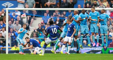 Football - Everton v Manchester City - Barclays Premier League - Goodison Park - 23/8/15 Everton's Romelu Lukaku shoots from a free kick Action Images via Reuters / Jason Cairnduff Livepic EDITORIAL USE ONLY. No use with unauthorized audio, video, data, fixture lists, club/league logos or "live" services. Online in-match use limited to 45 images, no video emulation. No use in betting, games or single club/league/player publications. Please contact your account representative for further details.