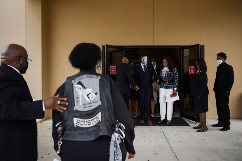 The Wider Image: 'I just ask God to help me': Texas funeral home crushed by death as U.S. COVID toll nears 500,000