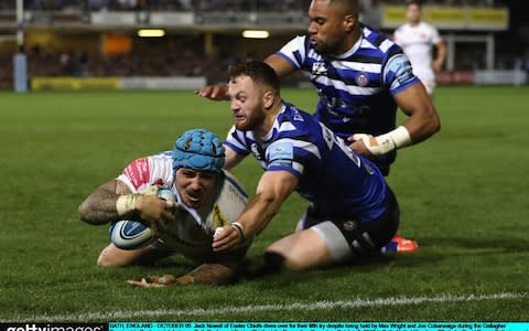 Max Wright attempts to prevent Exeter Chiefs wing Jack Nowell from scoring a fortnight ago. - Credit: Getty Images