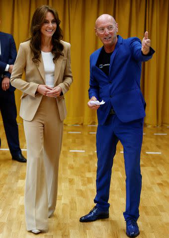 <p>Peter Nicholls - WPA Pool/Getty Images</p> Princess Kate meets frontline staff from Streets of Growth