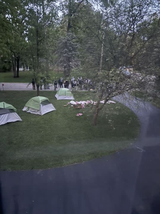 Pro-Palestinian protesters demonstrating outside the home of Sarah Hubbard, the chair of the University of Michigan’s governing board, on Wednesday, May 15, 2024 in Okemos. (Photo: Sarah Hubbard)