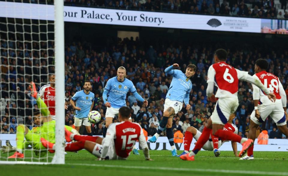 John Stones turns home City’s late second goal (Reuters)