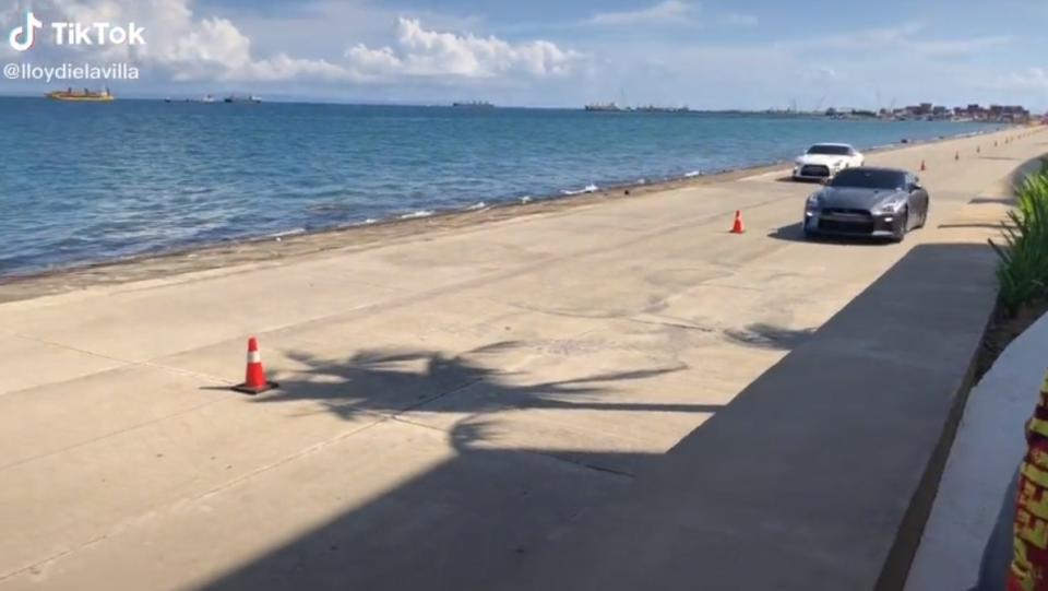 宿霧島的大型商場SM Seaside附近，舉辦了一場年度車子直線加速賽。（圖／翻攝自lloydielavilla抖音）