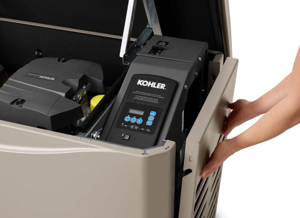 Kohler replacing side panel of generator