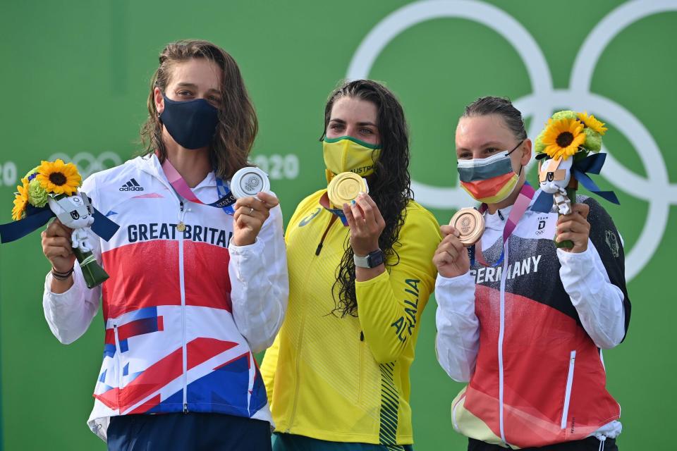 Mallory Franklin on the podium alongside Jessica Fox of Australia and Andrea Herzog of Germany