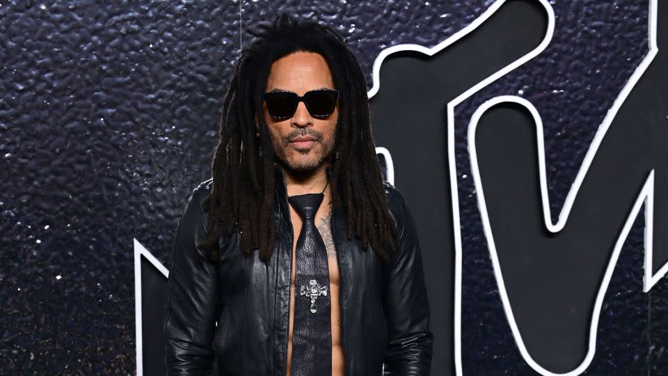 Lenny Kravitz, who was awarded the Best Rock VMA on the red carpet, arrived in a shirtless all-black leather look, complete with matching necktie. - Anthony Harvey/Shutterstock