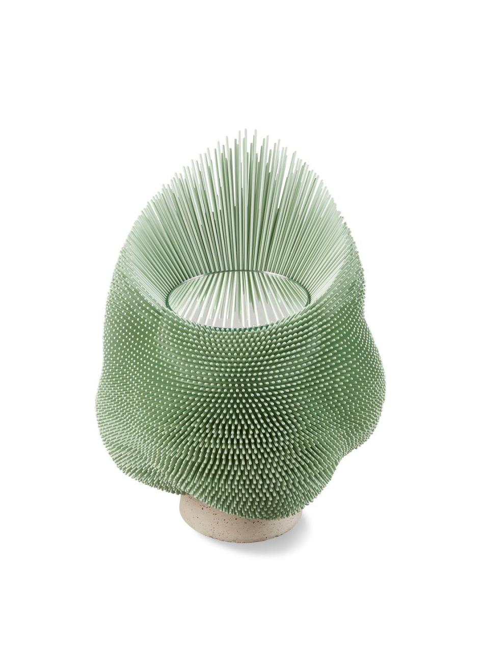 green spikey chair that looks like a sea anemone