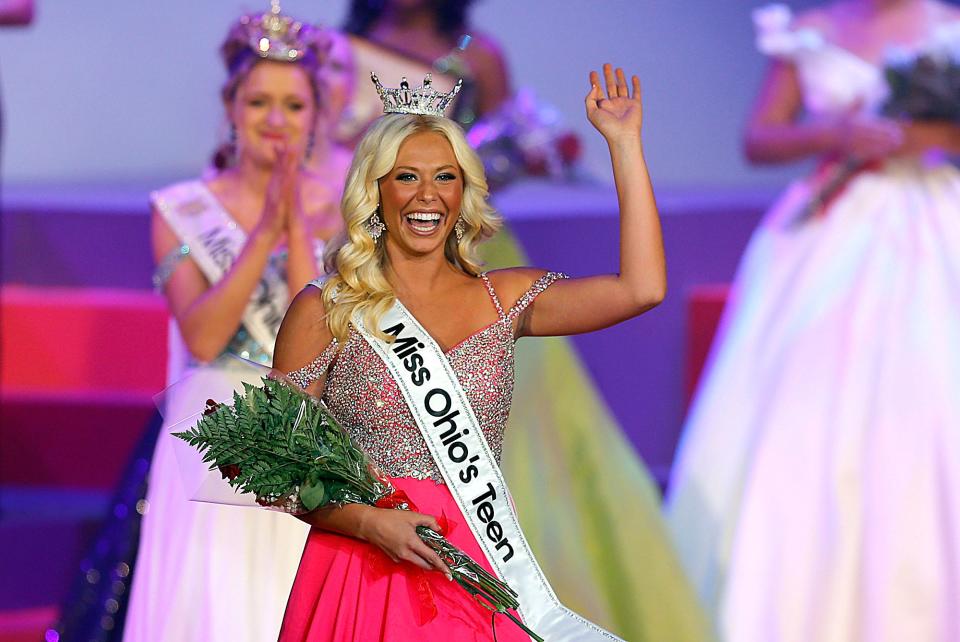 Miss Portsmouth Teen Paisley French waves to the crowd after being crowned Miss Ohio Teen 2023 during the evening gown competition of the Miss Ohio’s Teen pageant in June 2023 at the Renaissance Theater.