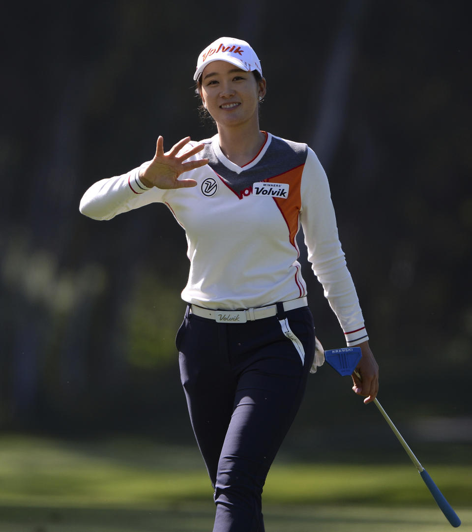 Chella Choi, of South Korea, gestures as she walks the 12th fairway during the first round of the Kia Classic LPGA golf tournament, Thursday, March 28, 2019, in Carlsbad, Calif. (AP Photo/Orlando Ramirez)