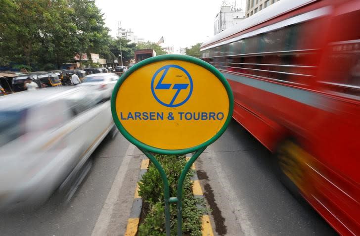 A sign of Larsen and Toubro (L&T) is placed on a road divider in Mumbai, India May 25, 2016. REUTERS/Shailesh Andrade