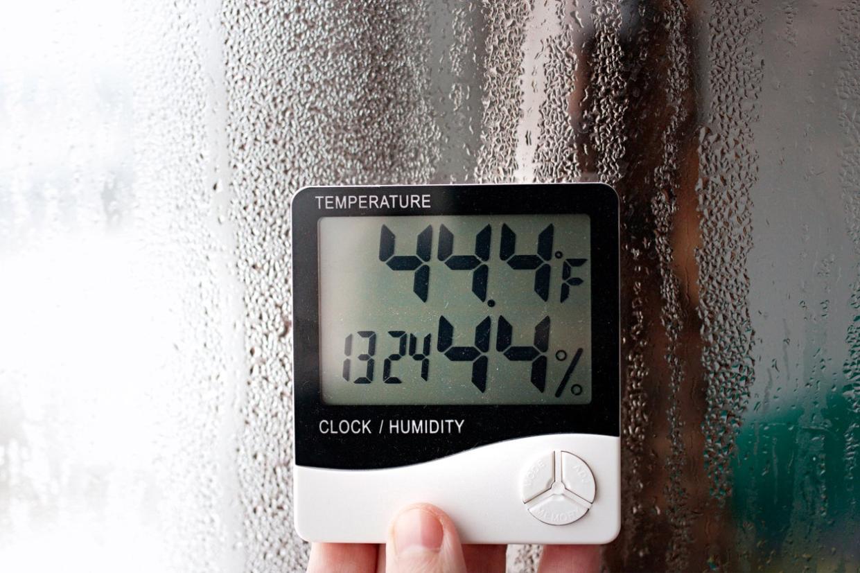 Electric humidity meter indicates moisture levels.