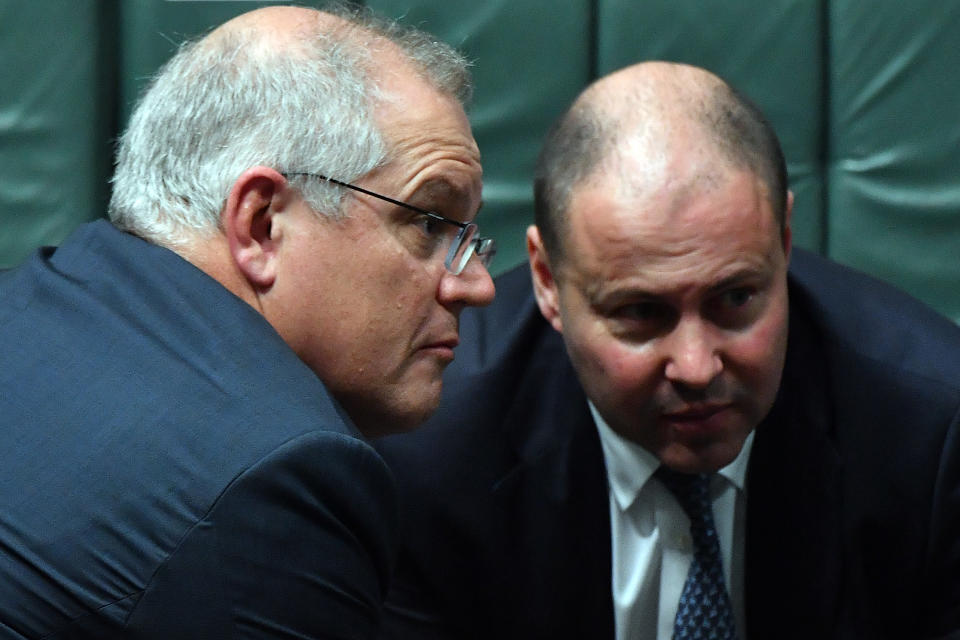 CANBERRA, AUSTRALIA - DECEMBER 07: Prime Minister Scott Morrison and Treasurer Josh Frydenberg during Question Time in the House of Representatives at Parliament House on December 07, 2020 in Canberra, Australia. The Federal Government will introduce its much-anticipated overhaul of industrial relations laws prompted by the upheaval of the coronavirus pandemic. The shake-up includes new arrangements for casual workers that could leave them with stronger rights for ongoing employment and limit employers' liability on paying casual leave loadings as well as paying other benefits however the legislation will not be voted on until 2021. (Photo by Sam Mooy/Getty Images)