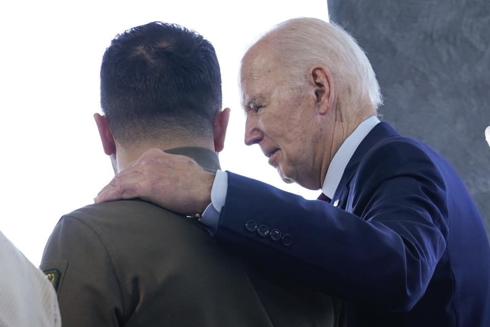 President Joe Biden, right, walks with Ukrainian President Volodymyr Zelenskyy ahead of a working session on Ukraine during the G7 Summit in Hiroshima, Japan, Sunday, May 21, 2023. (AP Photo/Susan Walsh, POOL)