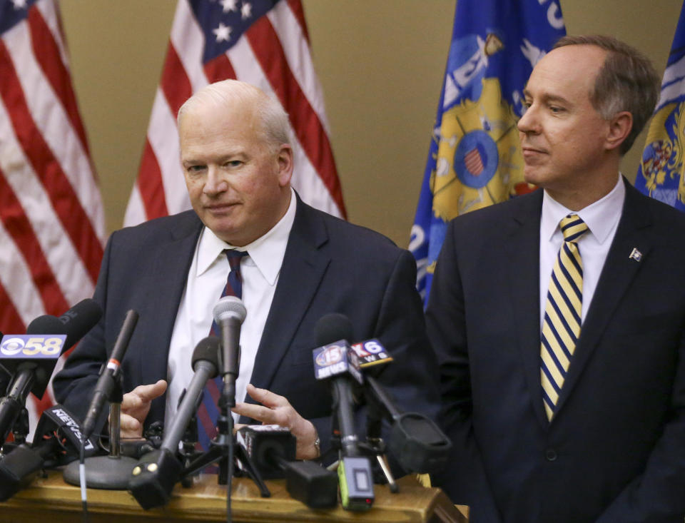 FILE--In this Thursday Feb. 28, 2019, file photo, Senate Majority Leader Scott Fitzgerald, R-Juneau, left, and Assembly Speaker Robin Vos, R-Rochester, speak to members of the media immediately following the governor's address to the joint legislature at the State Capitol Thursday Feb. 28, 2019, in Madison, Wis. Wisconsin Attorney General Josh Kaul has filed a motion to withdraw the state from an ongoing federal lawsuit seeking repeal of the Affordable Care Act. Kaul had been blocked from taking action under a law passed by the Republican Legislature in a lame-duck session shortly before he took office. A Dane County circuit judge on Thursday ruled that the laws were unconstitutionally passed, giving Kaul a window to take action. Republicans say they will appeal the ruling, which could result in a higher court putting Thursday's decision on hold. (Steve Apps/Wisconsin State Journal via AP, File)