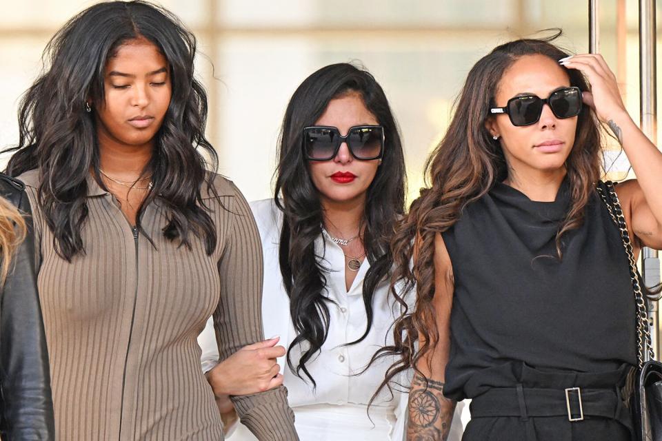 Vanessa Bryant (C), wife of the late Los Angeles Lakers basketball player Kobe Bryant, her daughter Natalia Bryant (L), and close friend Sydney Leroux (R) depart the court house in Los Angeles, California, on August 24, 2022, after a verdict was reached in Bryant's federal negligence lawsuit against Los Angeles County. - A jury ordered Los Angeles County to pay $31 million in damages Wednesday over graphic photos taken by sheriff's deputies and firefighters of the helicopter crash that killed basketball star Kobe Bryant. (Photo by Patrick T. FALLON / AFP) (Photo by PATRICK T. FALLON/AFP via Getty Images)