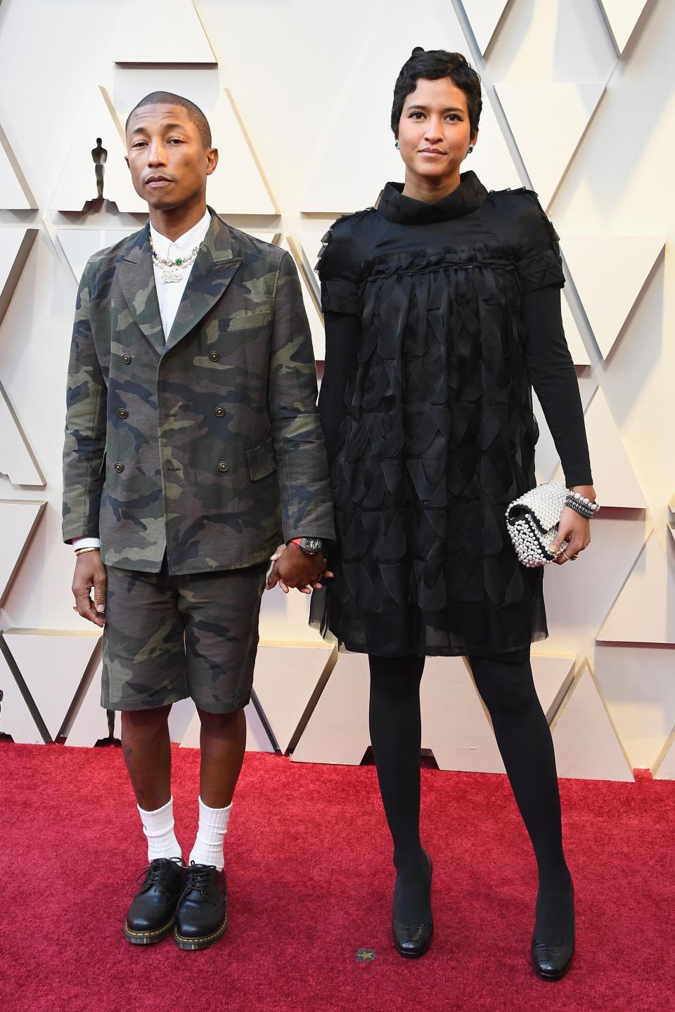 <h1 class="title">Pharrell Williams and Helen Lasichanh</h1><cite class="credit">Photo: Getty Images</cite>