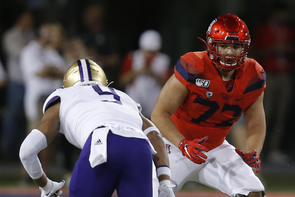 Arizona offensive lineman Edgar Burrola (72) in the first half during an NCAA college football game against Washington, Saturday, Oct. 12, 2019, in Tucson, Ariz. (AP Photo/Rick Scuteri)