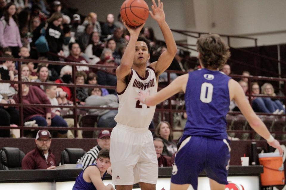 Brownwood's Bryson Monroe shoots a 3-pointer against Lampasas.