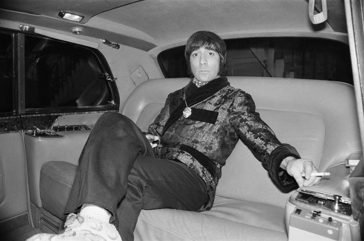 The Who rock group in concert at the Empire Pool, Wembley. Pictured is drummer Keith Moon smoking a cigarette in the back of a car. 24th October 1975. (Photo by Sunday Mirror/Mirrorpix/Mirrorpix via Getty Images)