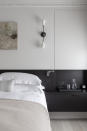 <p> 'A custom-made headboard is a great way to utilize an alcove in the bedroom,' says Tom Rutt, founder of TR Studio. ‘In our project NCH House we created a custom made timber headboard which wraps around the existing chimney stack, utilizing the recesses for storage with bedside tables from a rich, chocolate stained oak.  </p> <p> ‘Not only do the headboard and bedside tables provide storage with bedroom shelving and cupboard space, but they also frame the bed creating a focal point in the room. As the drawers were off the floor it also created the sense of a larger and more free-flowing space.’ </p>