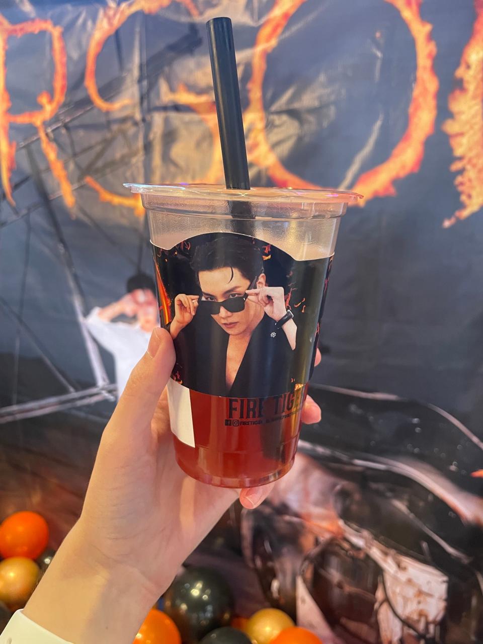 A strawberry tea soda featuring a cup sleeve for BTS' J-Hope at Fire Tiger Dessert Cafe in Mesa on Feb. 18, 2023.