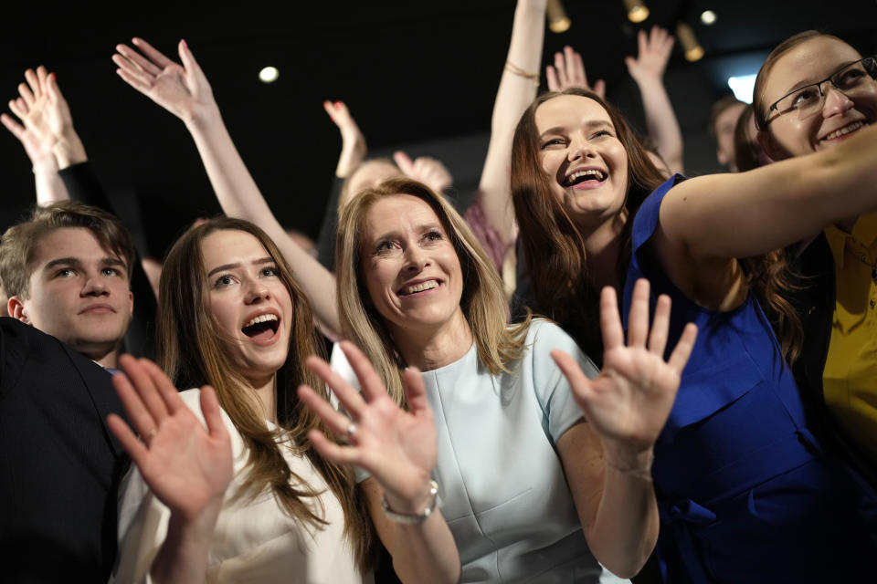 Members of the Reform Party and supporters of Prime Minister Kaja Kallas, centre, pose for photo in Tallinn, Estonia, Sunday, March 5, 2023. Voters in Estonia cast ballots Sunday in a parliamentary election that the center-right Reform Party of Prime Minister Kaja Kallas, one of Europe's most outspoken supporters of Ukraine, was considered a favorite to win. (AP Photo/Sergei Grits)