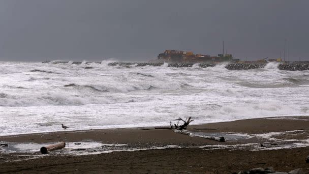 PHOTO: Waves from the Bering Sea splash up on a jetty, Sept. 16, 2022, in Nome, Alaska. (Peggy Fagerstrom/AP)