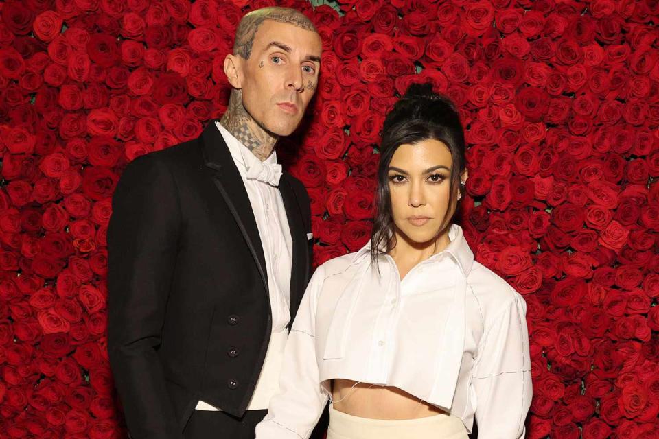 <p>Cindy Ord/MG22/Getty</p> Travis Barker and Kourtney Kardashian in New York City in May 2022