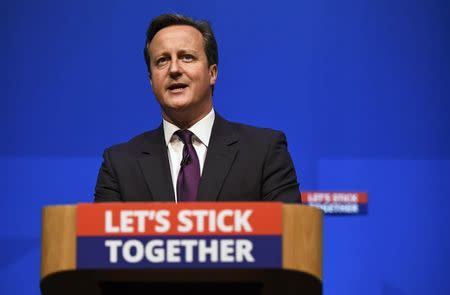 Britain's Prime Minister David Cameron delivers a speech at the Aberdeen Exhibition and Conference Centre in Aberdeen, Scotland September 15, 2014. REUTERS/Dylan Martinez