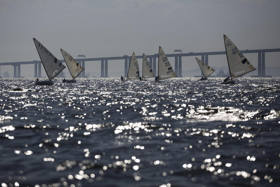 FILE - In this Aug. 3, 2014, file photo, athletes of the Finn class compete during the first test event for the Rio 2016 Olympic Games at the Guanabara Bay in Rio de Janeiro, Brazil. A drug-resistant “super bacteria” that’s normally found in hospitals and is notoriously difficult to treat has been discovered in the waters where Rio de Janeiro’s Olympic sailing events will be held, scientists with Brazil’s most respected health research institute said Monday Dec. 15, 2014. (AP Photo/Felipe Dana, File)