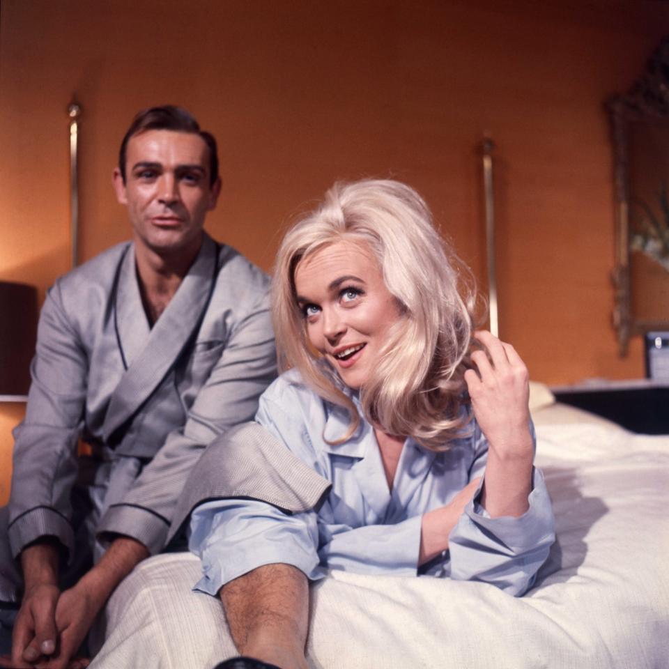 Shirley Eaton as Jill Masterson, voiced by Nikki van der Zyl, with Sean Connery in Goldfinger - Masheter Movie Archive/Alamy 