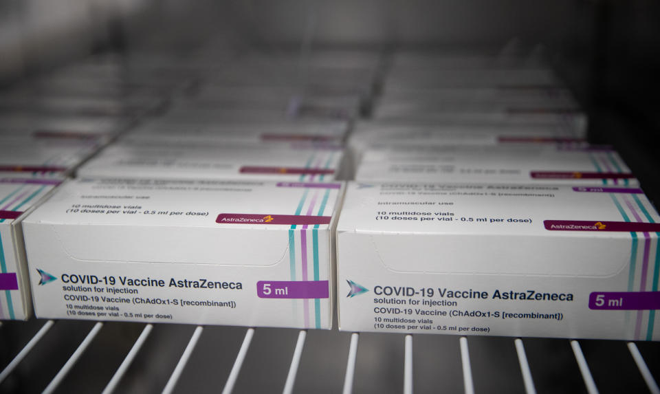 LONDON, ENGLAND - JANUARY 09: Boxes of vials of the AstraZeneca Covid vaccine sit in a fridge at Ashton Gate Stadium in Bristol, which is one of seven mass vaccination centres which will open on Monday, as the government continues to ramp up the vaccination programme against Covid-19 on January 9, 2021 in London, England. (Photo by Andrew Matthews-WPA Pool/Getty Images)