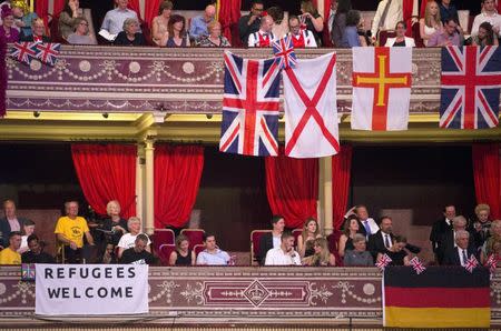 Flags are seen during the last night of the BBC Proms festival of classical music at the Royal Albert Hall in London, Britain September 12, 2015. REUTERS/Neil Hall