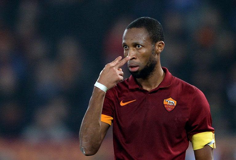 AS Roma's Malian midfielder Seydou Keita celebrates after scoring a goal during the Italian Serie A football match between AS Roma and Juventus in Rome on March 2, 2015