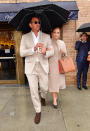 <p>They also stepped out together in matching beige ensembles in March in New York City. Lopez donned a Max Mara coat that she paired with a Christian Louboutin studded tote, while Rodriguez sported a cream suit. (Photo: Getty Images) </p>