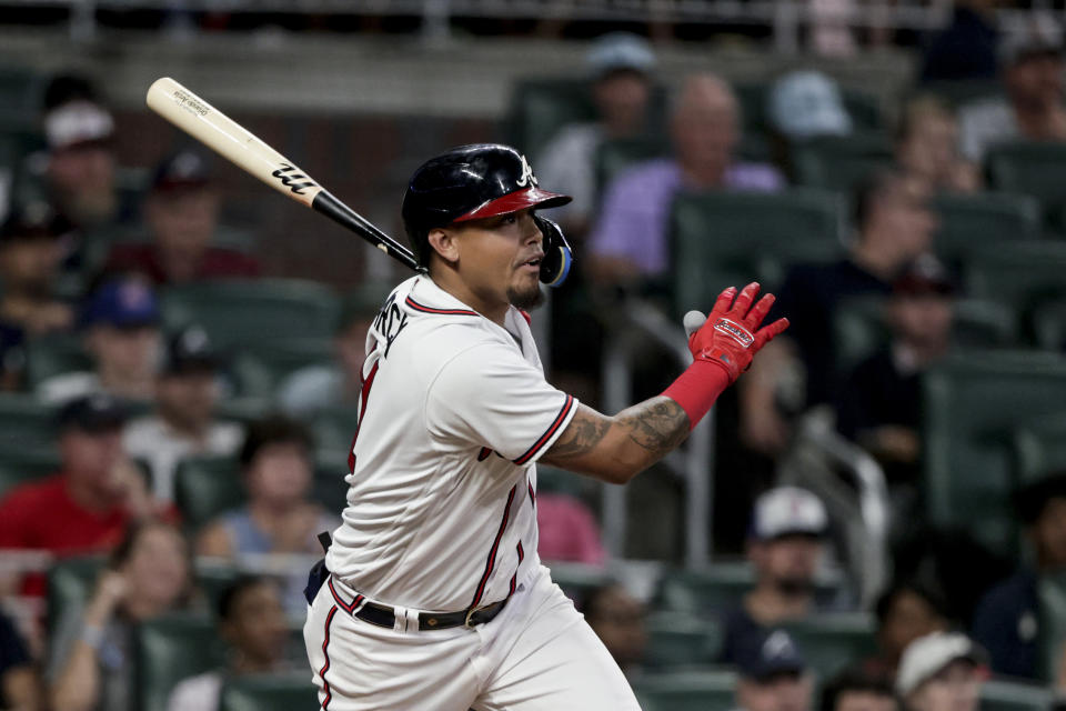 Atlanta Braves' Orlando Arcia watches his single during the sixth inning of the team's baseball game against the Arizona Diamondbacks on Saturday, July 30, 2022, in Atlanta. (AP Photo/Butch Dill)