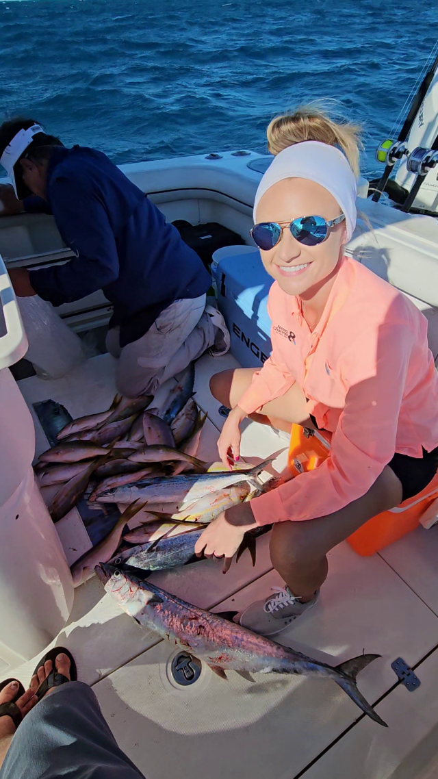 Women Drops Fishing Pole on Boat